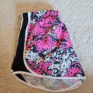 Pink and white nike athletic shorts